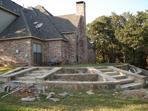 Natural stone with stairs flower beds