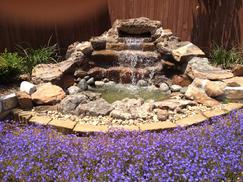 Waterfall with natural stone and/or rocks