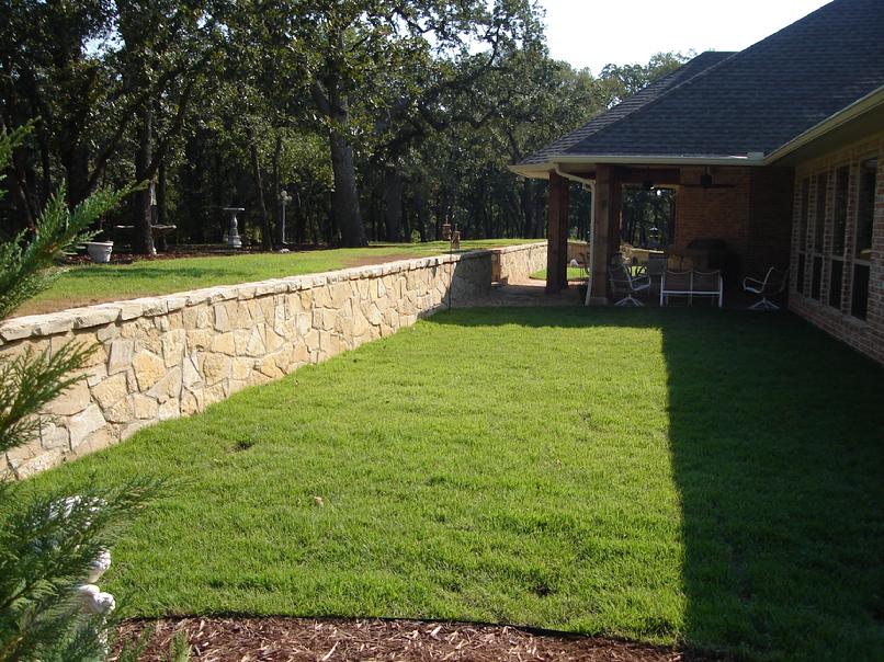 Landscaping and retaining wall